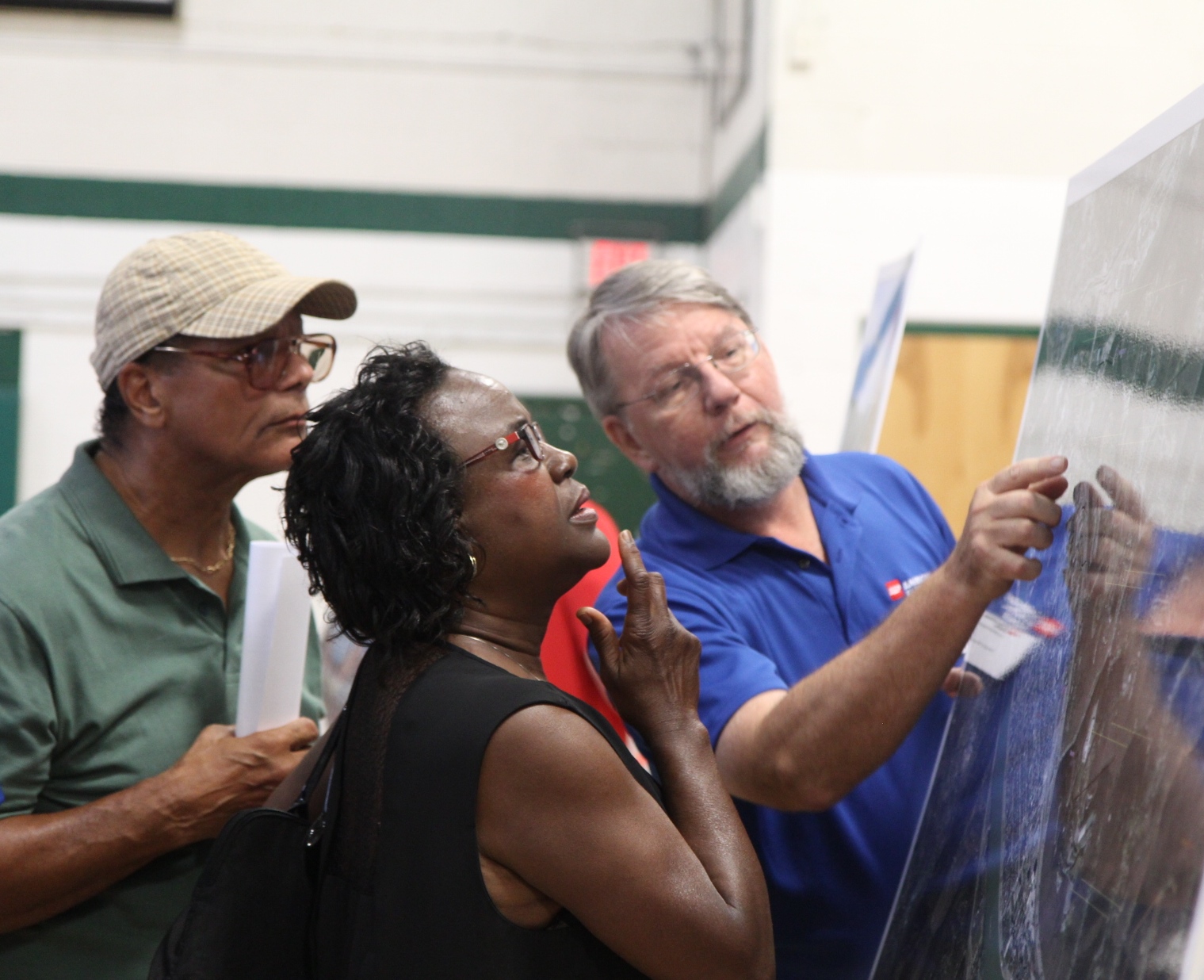 Showing property owners map of project at an open house